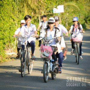 kids in vietnam riding bicycles